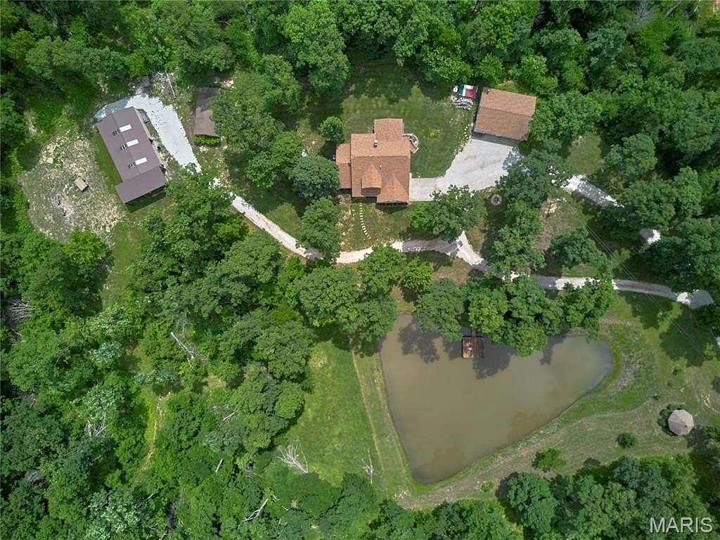 20.5 Acres of Agricultural Land with Home for Sale in Troy, Missouri