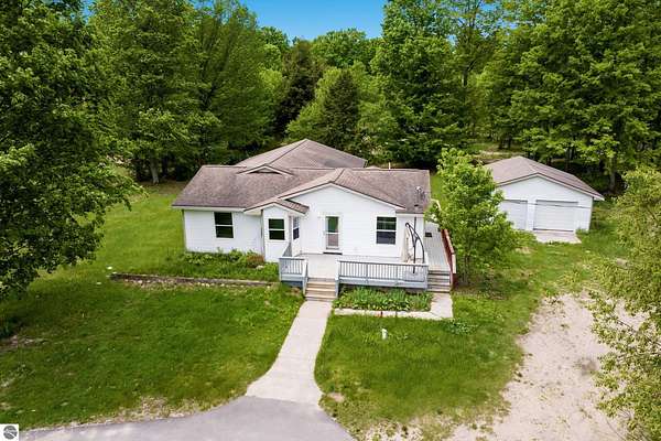 10 Acres of Land with Home for Sale in Beulah, Michigan
