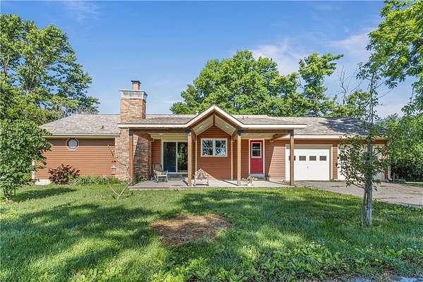 9.44 Acres of Land with Home for Sale in Warrensburg, Missouri