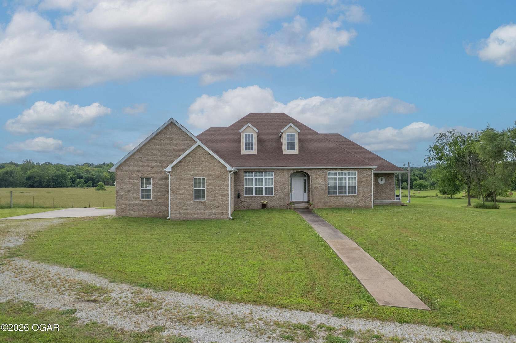 94 Acres of Land with Home for Sale in Wyandotte, Oklahoma