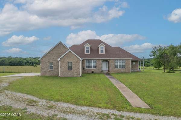 94 Acres of Land with Home for Sale in Wyandotte, Oklahoma