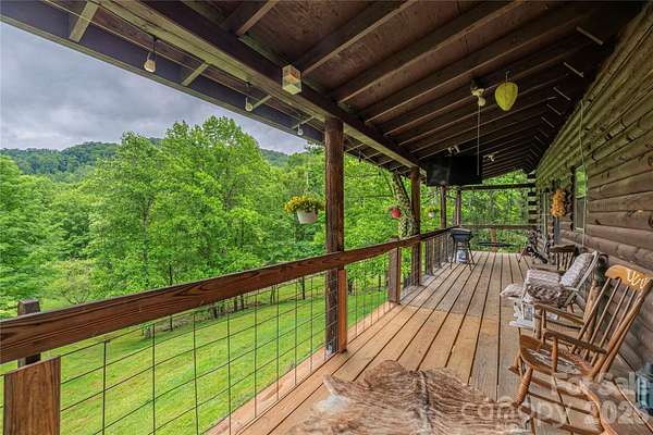 10.6 Acres of Land with Home for Sale in Clyde, North Carolina