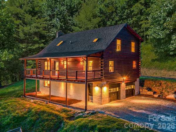 10.6 Acres of Land with Home for Sale in Clyde, North Carolina