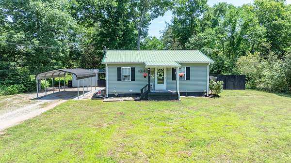 9.13 Acres of Land with Home for Sale in Lewisburg, Tennessee