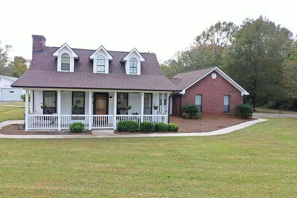 6.84 Acres of Land with Home for Sale in Laurel, Mississippi