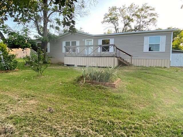 1.56 Acres of Land with Home for Sale in Ravenna, Texas