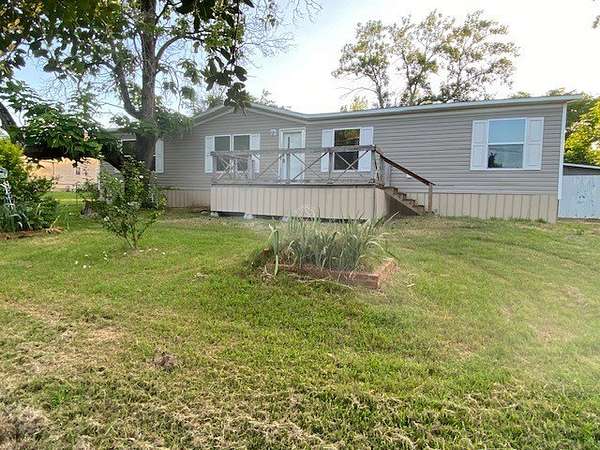 1.56 Acres of Land with Home for Sale in Ravenna, Texas