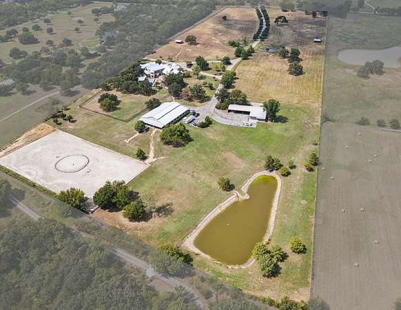 26 Acres of Agricultural Land with Home for Sale in Bartonville, Texas