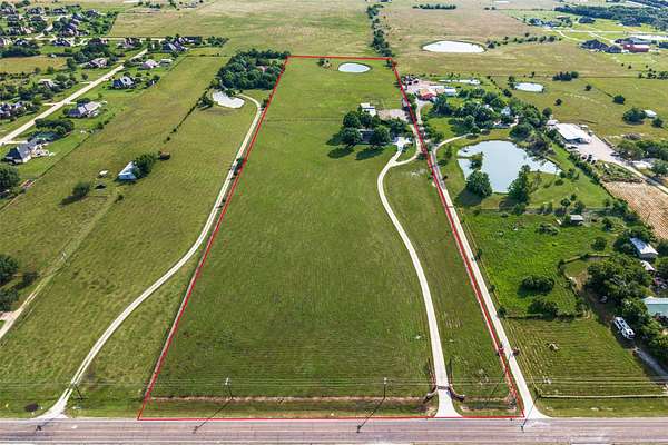 15.8 Acres of Land with Home for Sale in McLendon-Chisholm, Texas
