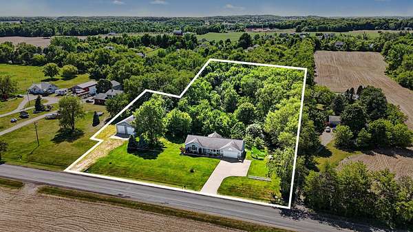 3.58 Acres of Land with Home for Sale in Caledonia, Michigan