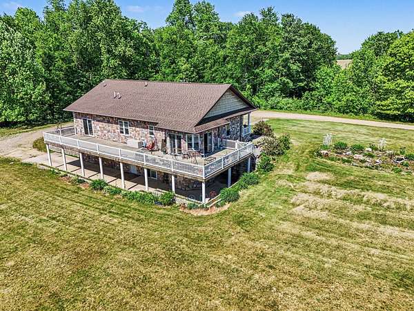56.5 Acres of Land with Home for Sale in Fulton, Michigan