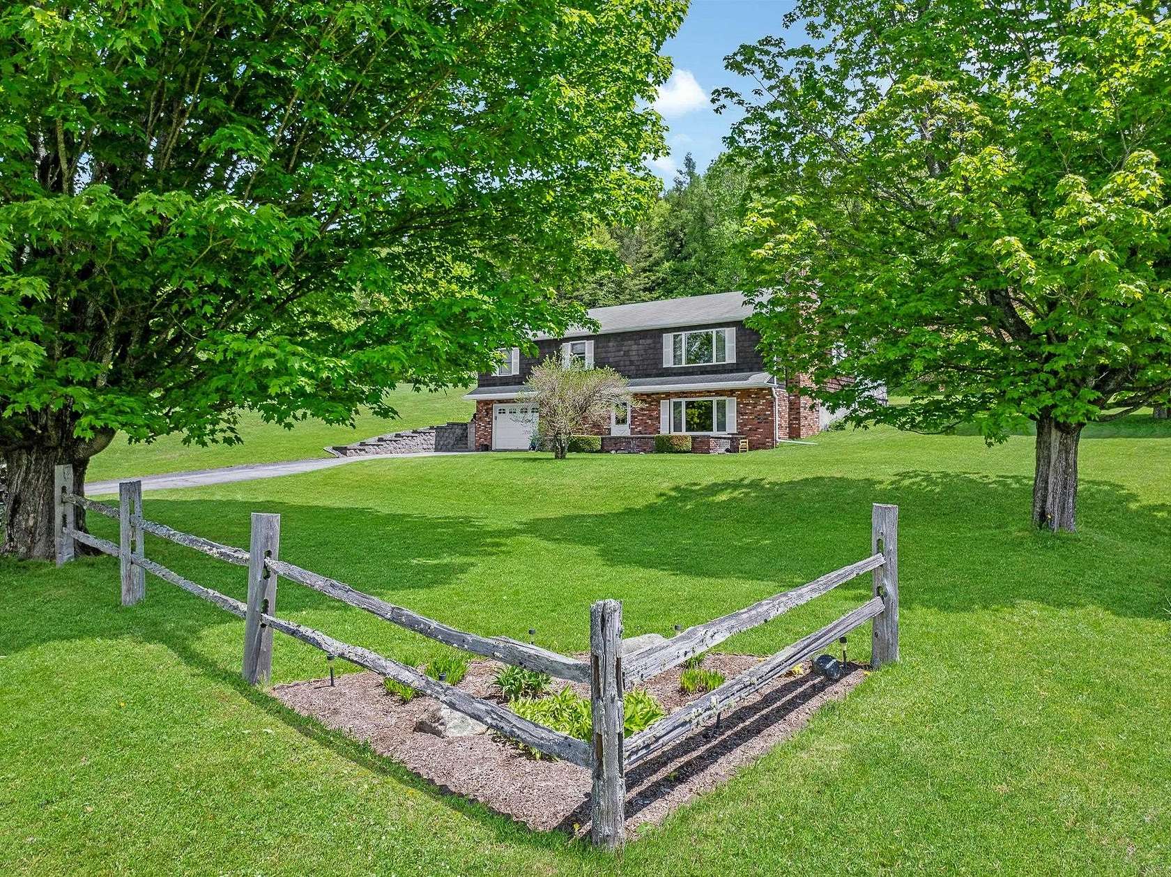 1.5 Acres of Land with Home for Sale in Colebrook, New Hampshire