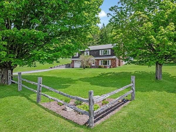 1.5 Acres of Land with Home for Sale in Colebrook, New Hampshire