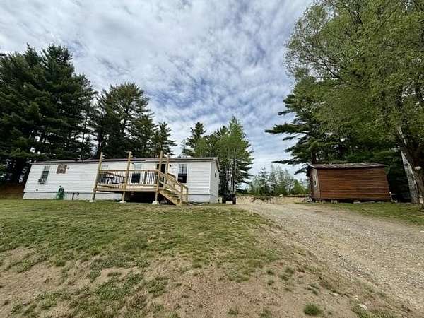 1.57 Acres of Land with Home for Sale in Milan, New Hampshire