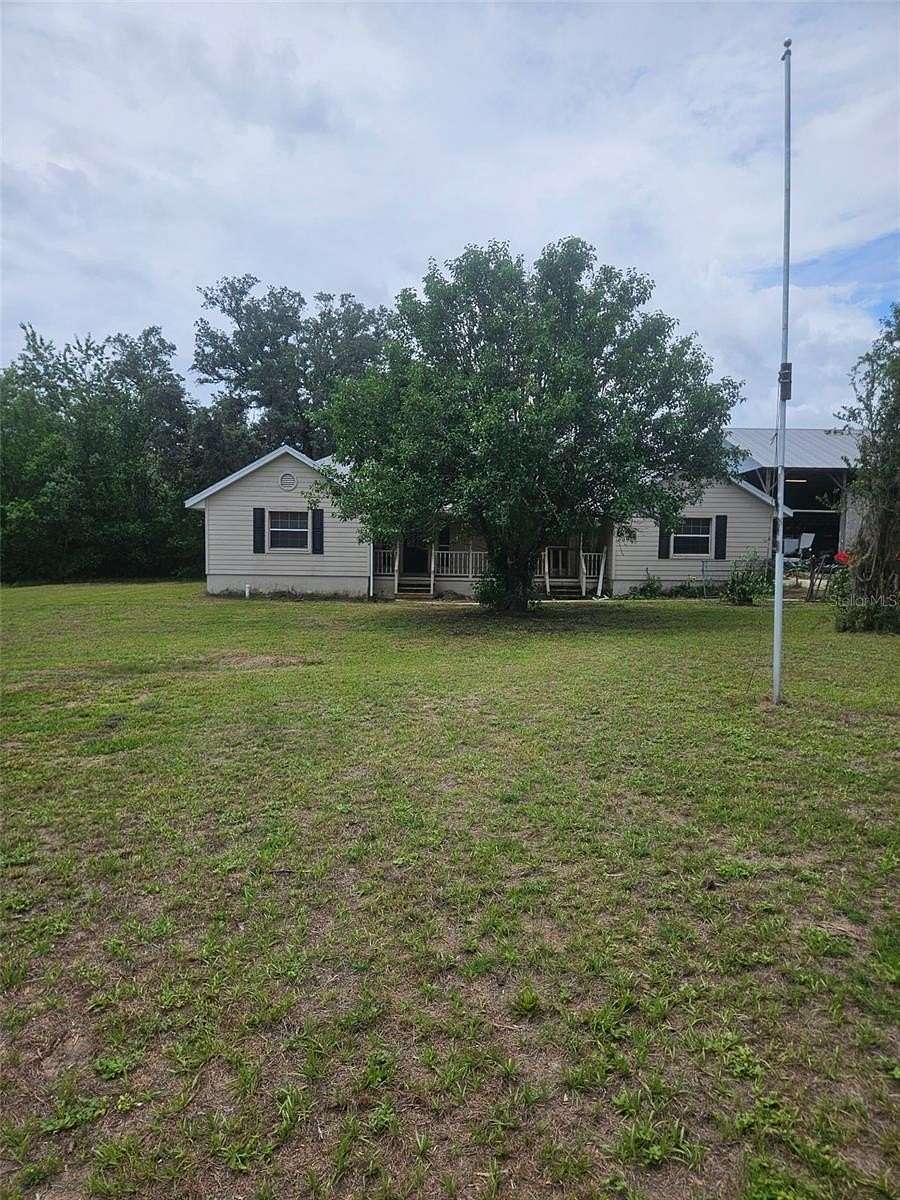 7.6 Acres of Land with Home for Sale in Dunnellon, Florida
