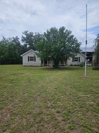 7.6 Acres of Land with Home for Sale in Dunnellon, Florida
