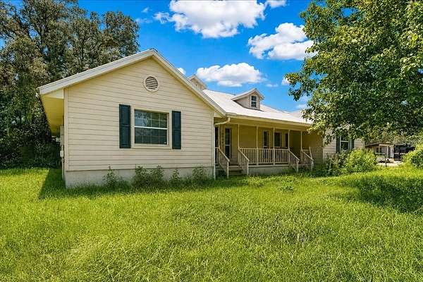 7.6 Acres of Land with Home for Sale in Dunnellon, Florida