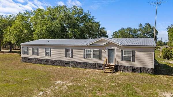 10 Acres of Land with Home for Sale in Trenton, Florida