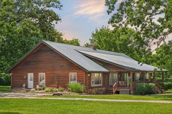 19.4 Acres of Land with Home for Sale in Dunnegan, Missouri