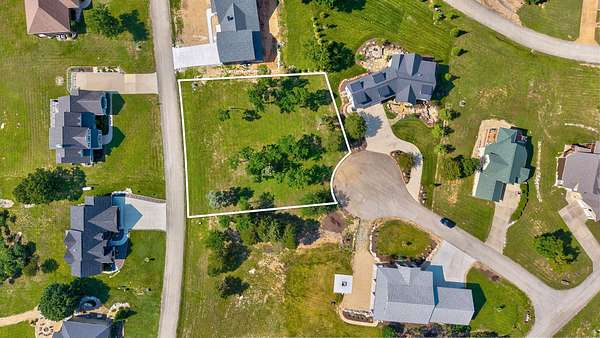 0.58 Acres of Residential Land for Sale in Lampe, Missouri