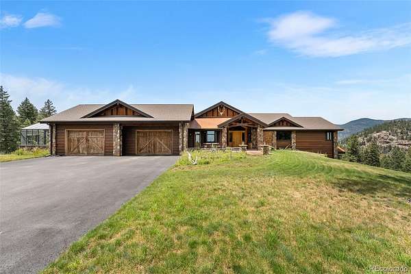 10.3 Acres of Recreational Land with Home for Sale in Evergreen, Colorado