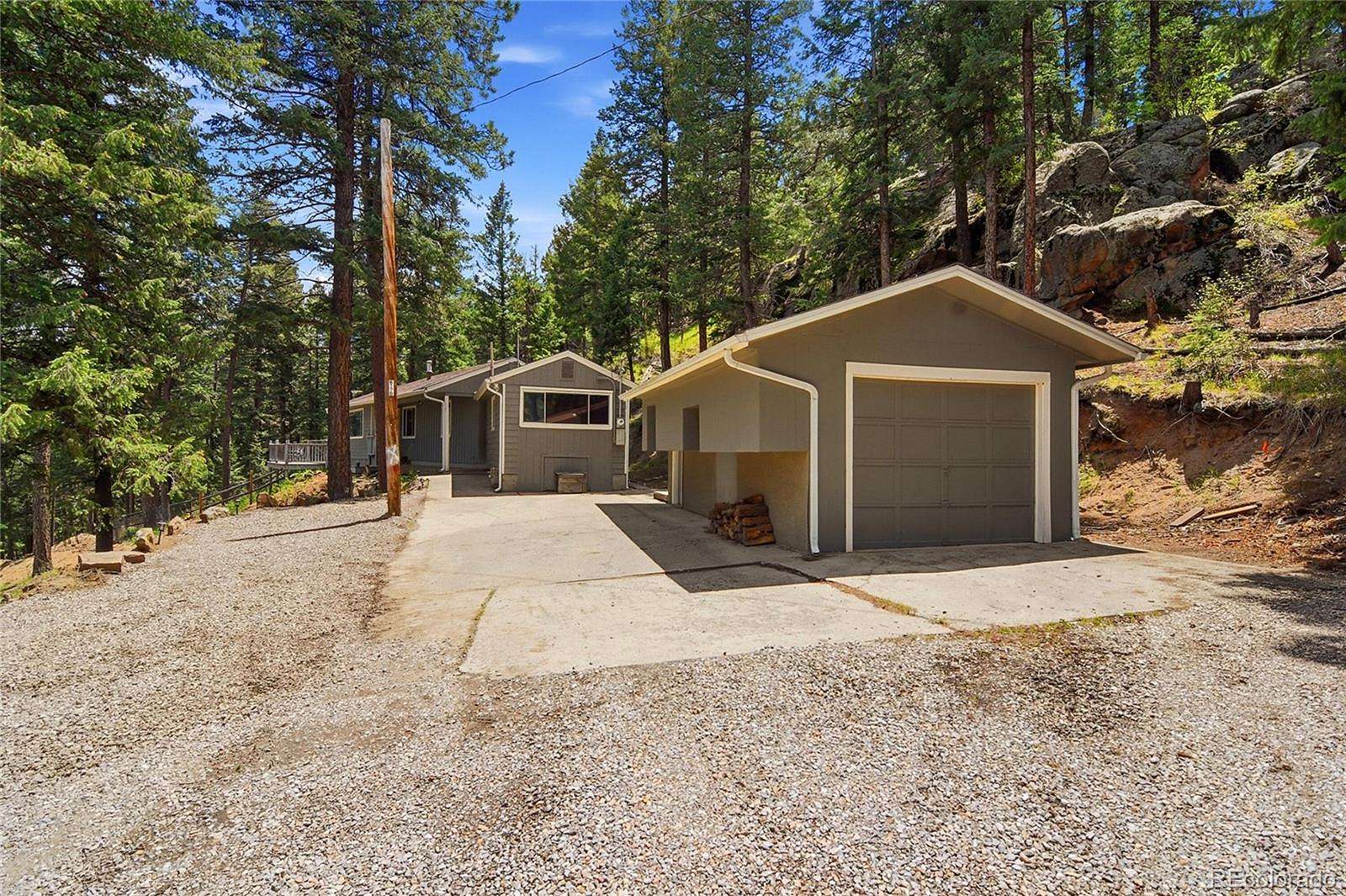 1.73 Acres of Land with Home for Sale in Evergreen, Colorado