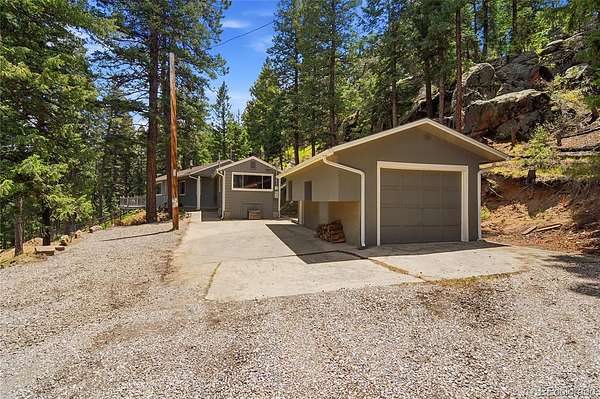 1.73 Acres of Land with Home for Sale in Evergreen, Colorado