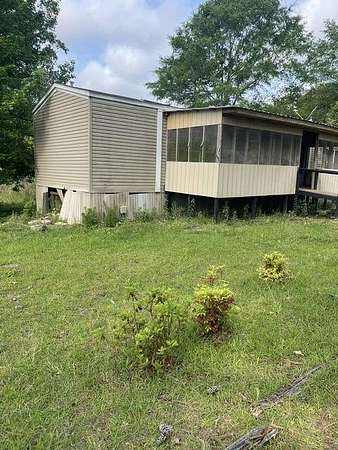 5.5 Acres of Land with Home for Sale in Bay Springs, Mississippi