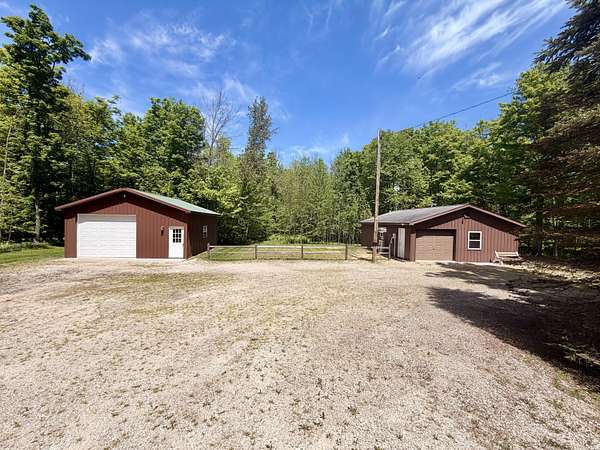 2.5 Acres of Land with Home for Sale in Curtis, Michigan