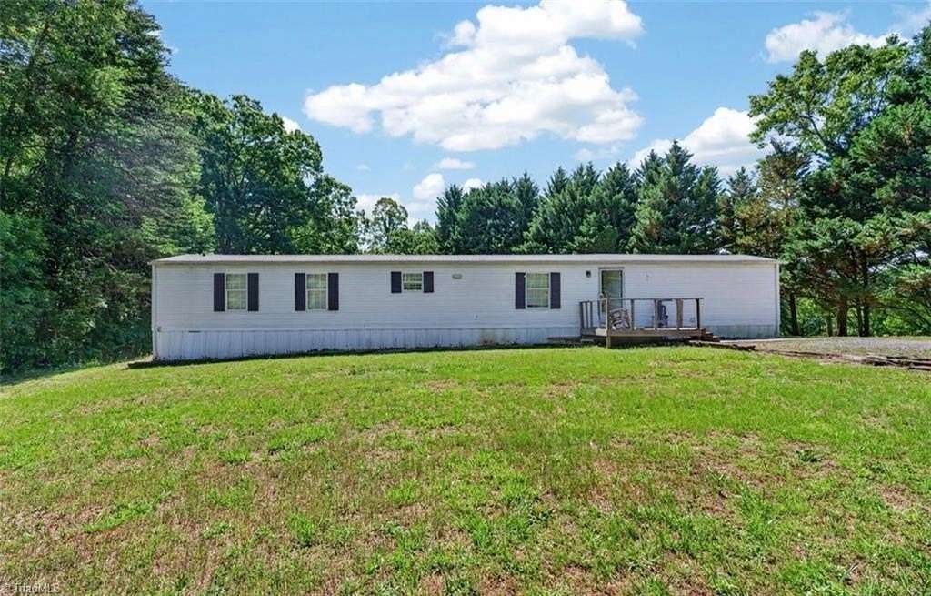 3.74 Acres of Land with Home for Sale in Pinnacle, North Carolina