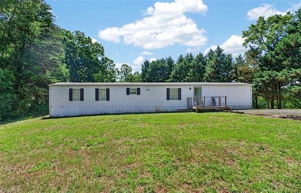3.74 Acres of Land with Home for Sale in Pinnacle, North Carolina