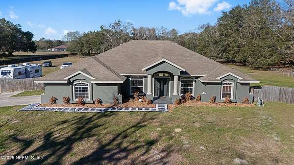 5 Acres of Land with Home for Sale in Brooker, Florida