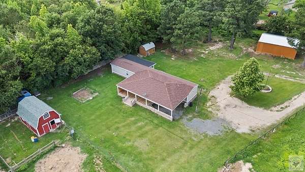 9.55 Acres of Land with Home for Sale in New Boston, Texas