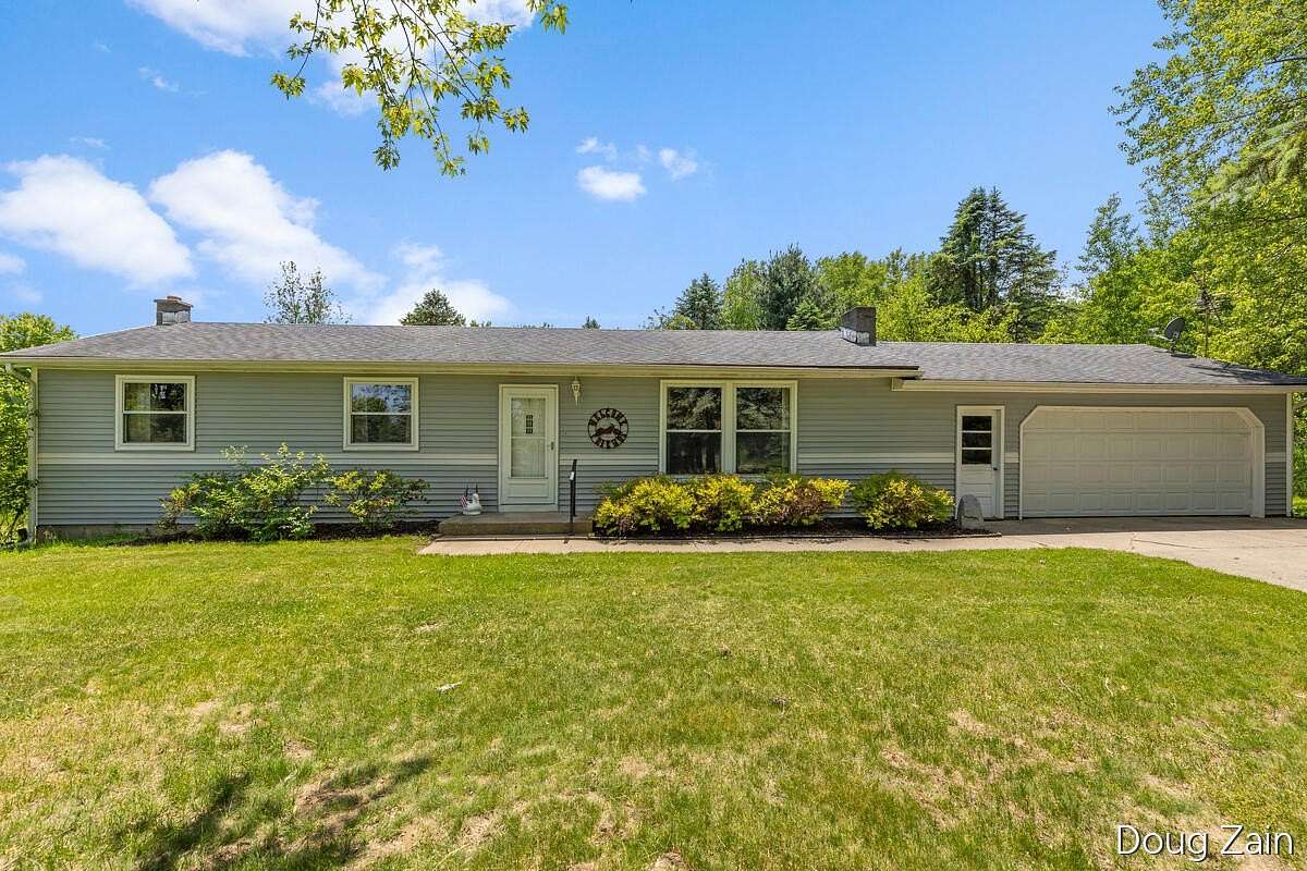 2 Acres of Land with Home for Sale in Rockford, Michigan