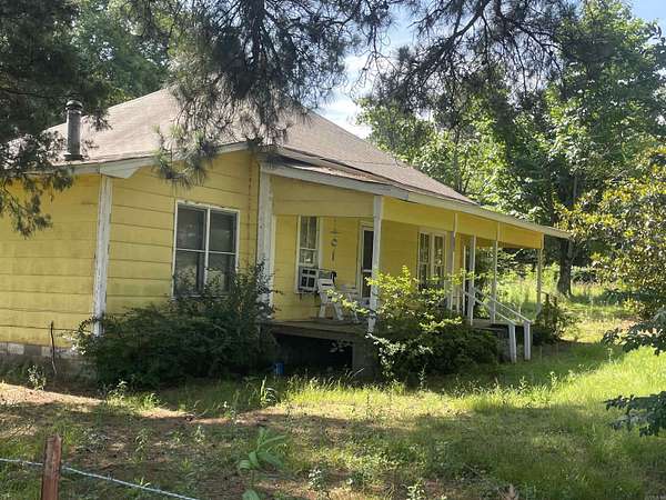 9.9 Acres of Land with Home for Sale in Bigelow, Arkansas