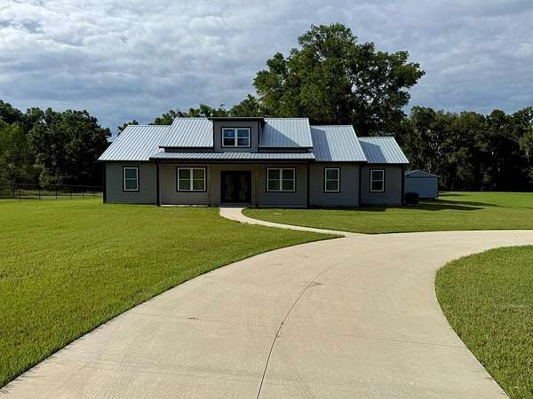 5.49 Acres of Land with Home for Sale in Old Town, Florida