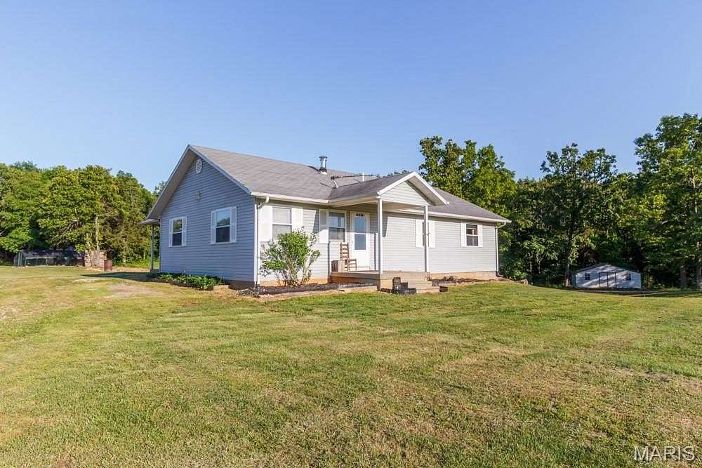 9.13 Acres of Land with Home for Sale in Lebanon, Missouri