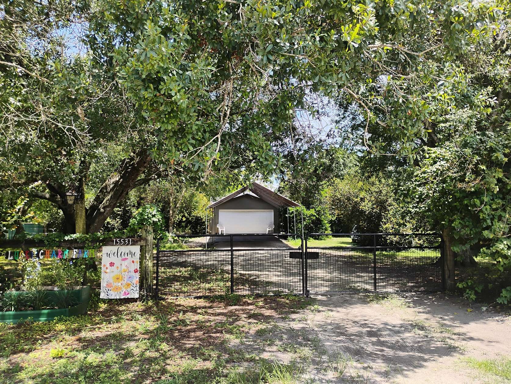 2.5 Acres of Land with Home for Sale in Loxahatchee Groves, Florida
