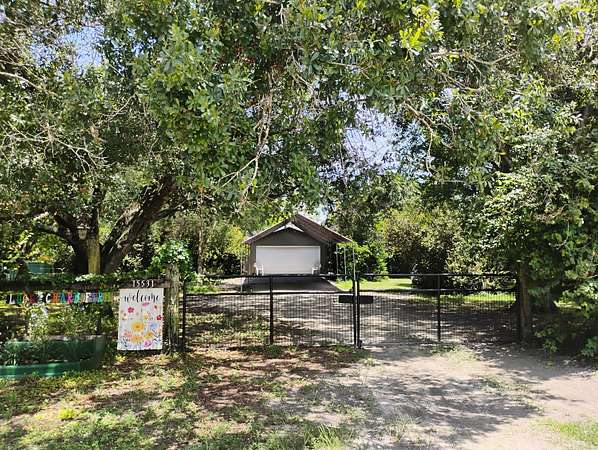 2.5 Acres of Land with Home for Sale in Loxahatchee Groves, Florida