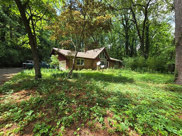 8 Acres of Land with Home for Sale in Decatur, Alabama