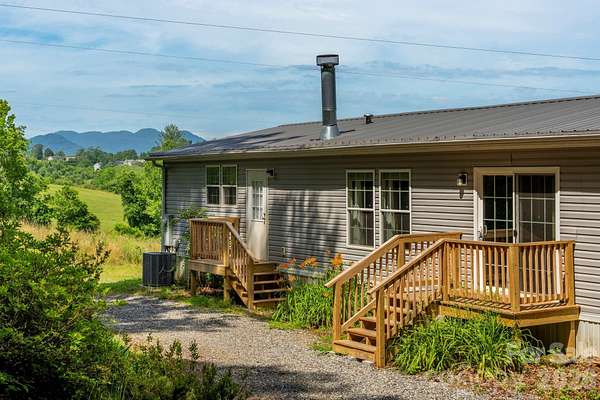 14.3 Acres of Land with Home for Sale in Alexander, North Carolina