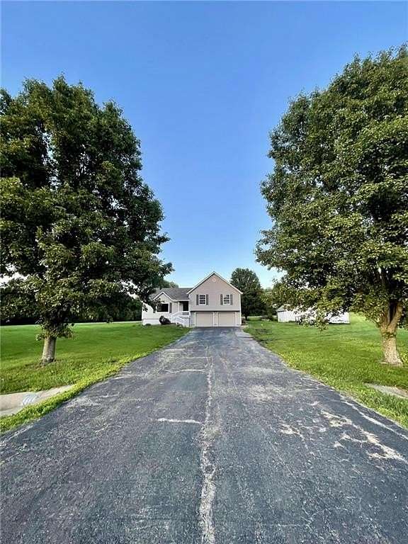 3.7 Acres of Land with Home for Sale in Peculiar, Missouri