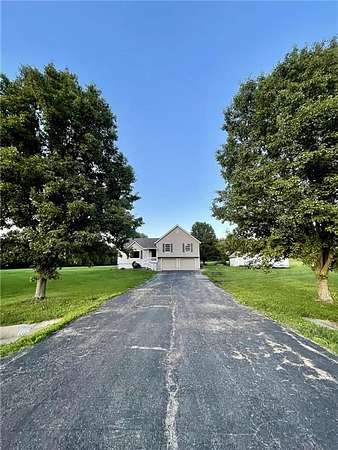 3.7 Acres of Land with Home for Sale in Peculiar, Missouri