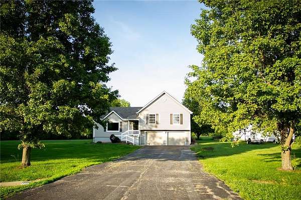 3.7 Acres of Land with Home for Sale in Peculiar, Missouri