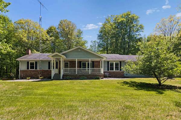 8 Acres of Land with Home for Sale in North Street, Michigan