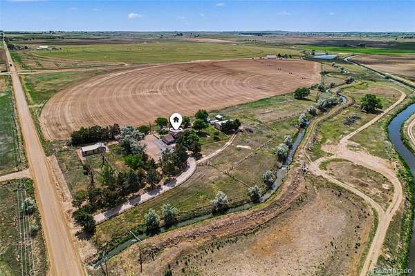 4.86 Acres of Land with Home for Sale in Platteville, Colorado