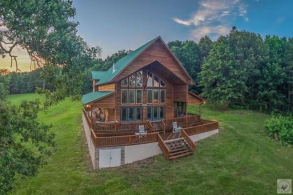 75.4 Acres of Recreational Land with Home for Sale in Atlanta, Texas