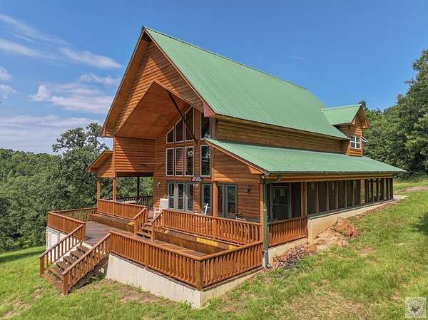 75.4 Acres of Recreational Land with Home for Sale in Atlanta, Texas