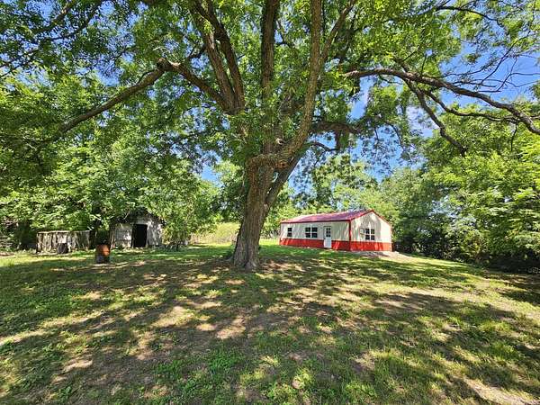 28.1 Acres of Land with Home for Sale in Powell, Missouri