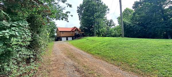 30.8 Acres of Recreational Land with Home for Sale in Pegram, Tennessee